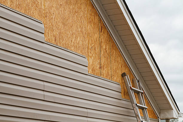 Professional Siding Installation technician working in Magnolia, OH